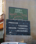 840171 Afbeelding van twee gerestaureerde muurreclames voor rookwaren, op de zijgevel van het pand Oudwijkerveldstraat ...
